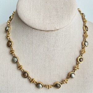 Lady Remington goldtone linked necklace with two tone brushed metal cabochons